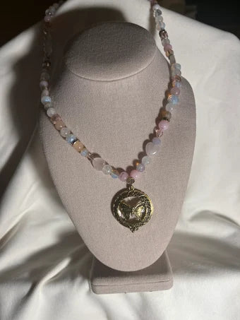 Magnifying glass with beaded necklace