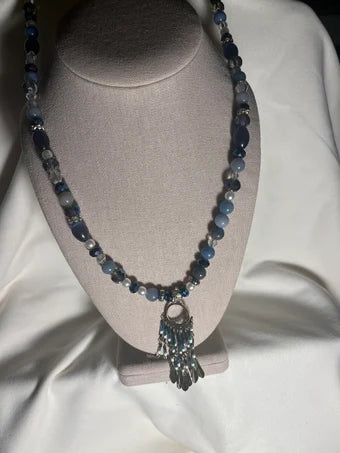 Feathered charm beaded necklace